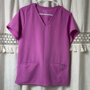 FIGS Women's Short Sleeve V-Neck Top in Magenta. PO#6002